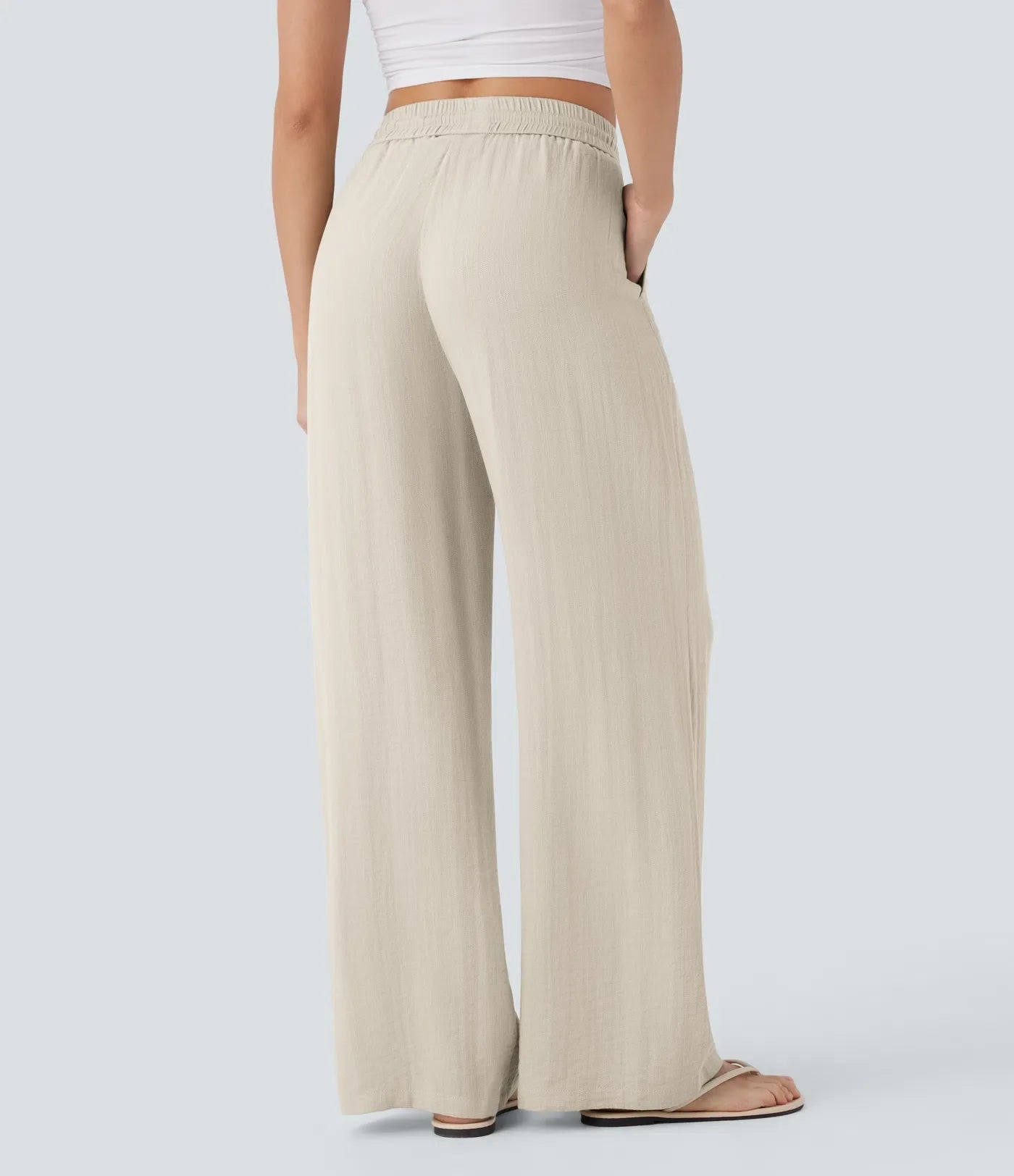 Pantalon fluide taille haute coupe large, effet lin premium avec cordon ajustable et poches discrètes