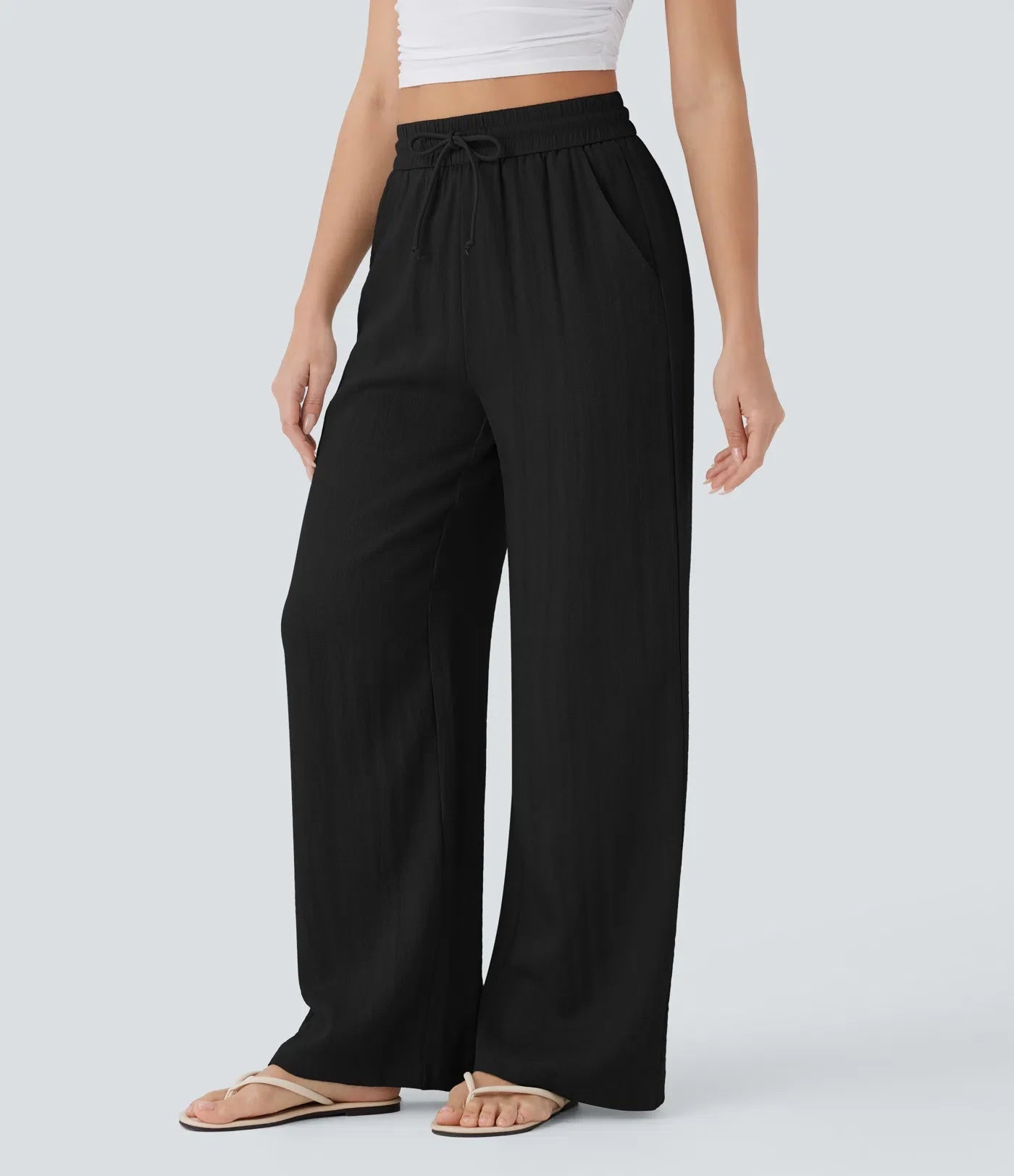 Pantalon fluide taille haute coupe large, effet lin premium avec cordon ajustable et poches discrètes