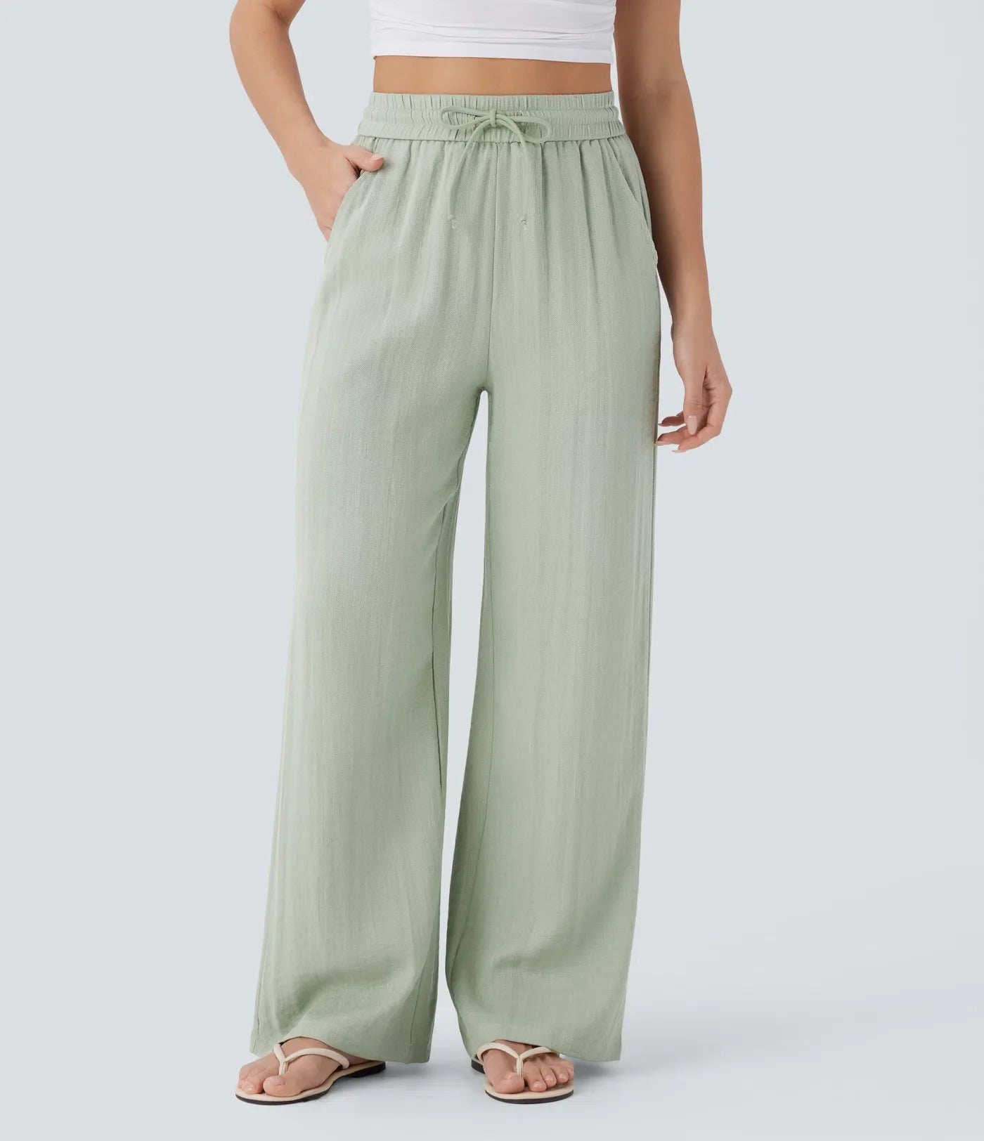 Pantalon fluide taille haute coupe large, effet lin premium avec cordon ajustable et poches discrètes