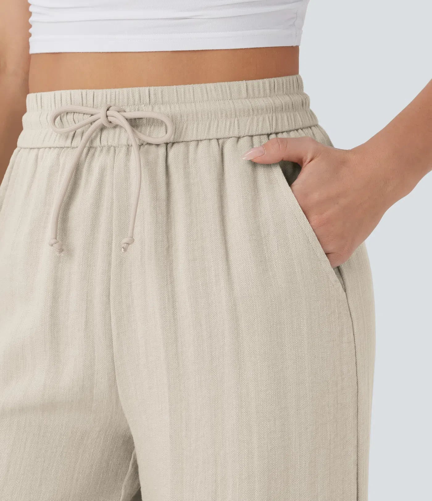 Pantalon fluide taille haute coupe large, effet lin premium avec cordon ajustable et poches discrètes