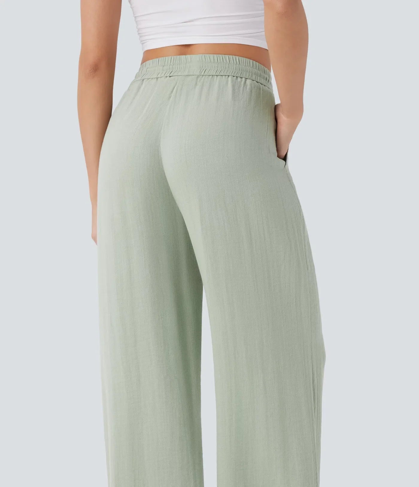 Pantalon fluide taille haute coupe large, effet lin premium avec cordon ajustable et poches discrètes
